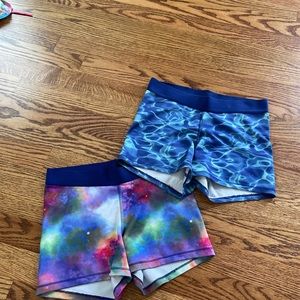 (2) pairs of spandex shorts